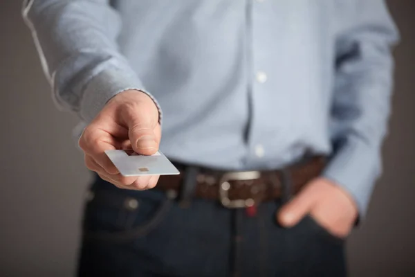 Man holding plastic card — Stock Photo, Image