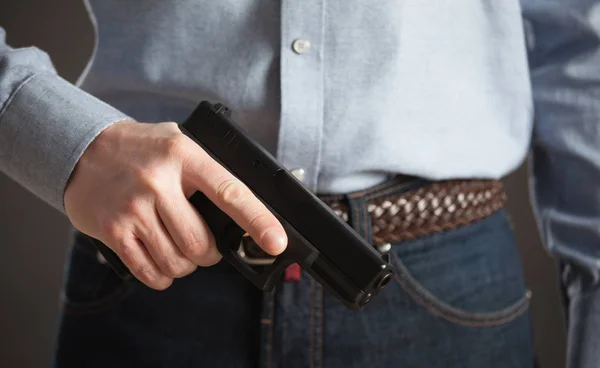 Man holding pneumatic gun — Stock Photo, Image