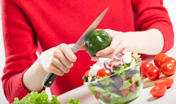Woman cooking salad — Stock Photo, Image