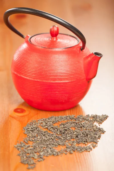 Red teapot and green tea — Stock Photo, Image