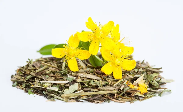 Pile of tea and flowers — Stock Photo, Image