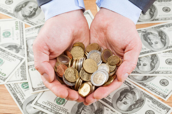 hands holding coins
