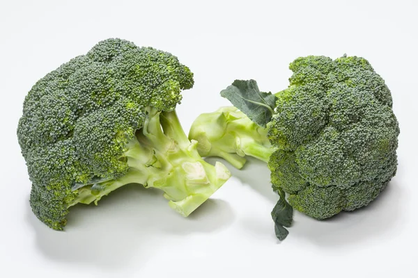 Fresh broccoli on white — Stock Photo, Image