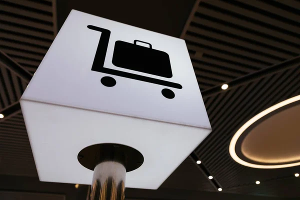 Luggage carrying logo on the stand — Stock Photo, Image