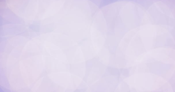 Se déplaçant lentement énormes cercles bokeh déconcentrés dans le bleu backround 