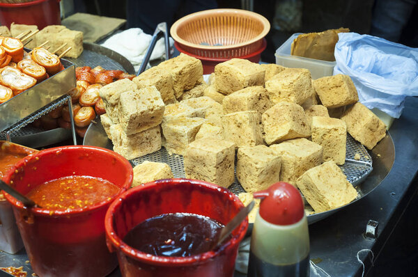 Stinky fried tofu at a Hong Kong street food stall