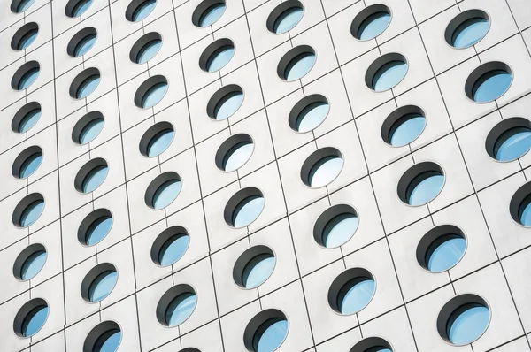 Closeup view of the distinctive circular windows of Jardine House, Hong Kong — Stock Photo, Image