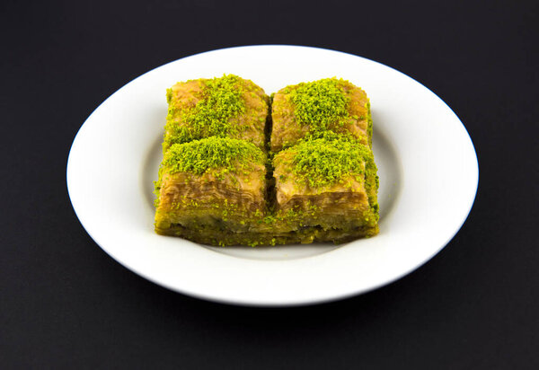 Turkish sweet baklava on plate. Traditional Baklava. 