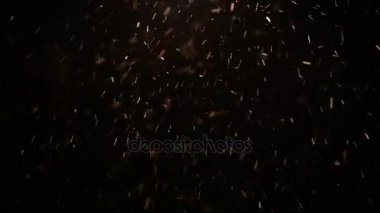 Hava kıvılcımlar uçuşuyordu kar parlayan parçacıklar koyu turuncu arka ışık Noel renk