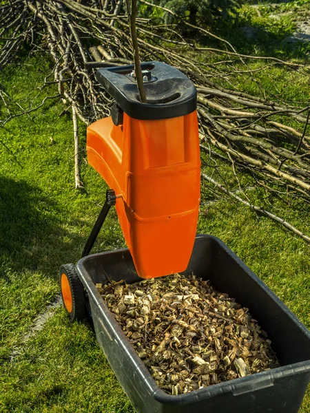 Wood shredder with wood chips — Stock Photo, Image