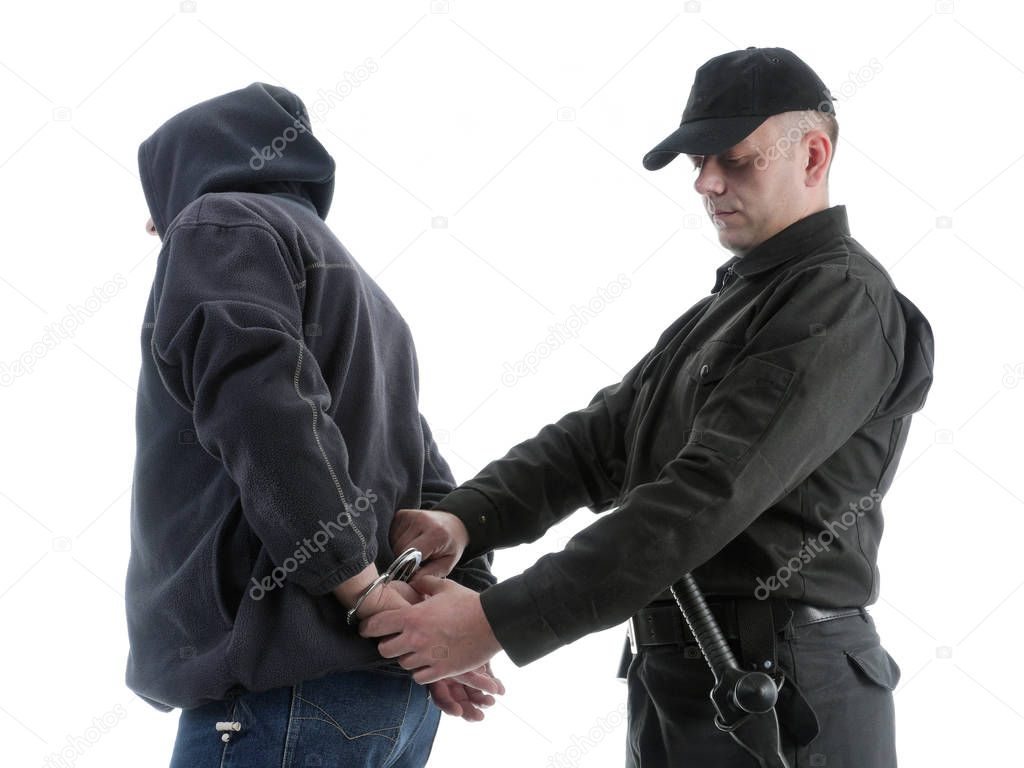 Man handcuffed by policeman