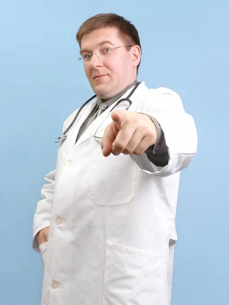 Family doctor pointing — Stock Photo, Image