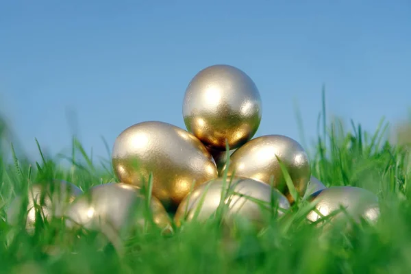 Golden egg pyramid — Stock Photo, Image