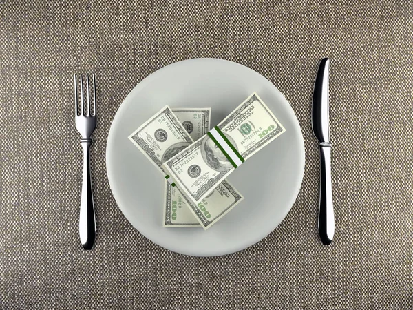 Wads dolarów podawane na talerzu — Zdjęcie stockowe