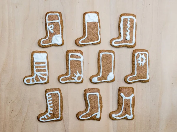 Christmas gingerbread shoe-shaped cookies — Stock Photo, Image
