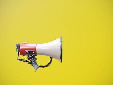 Sarı arkaplana karşı megafonun yan görüntüsü