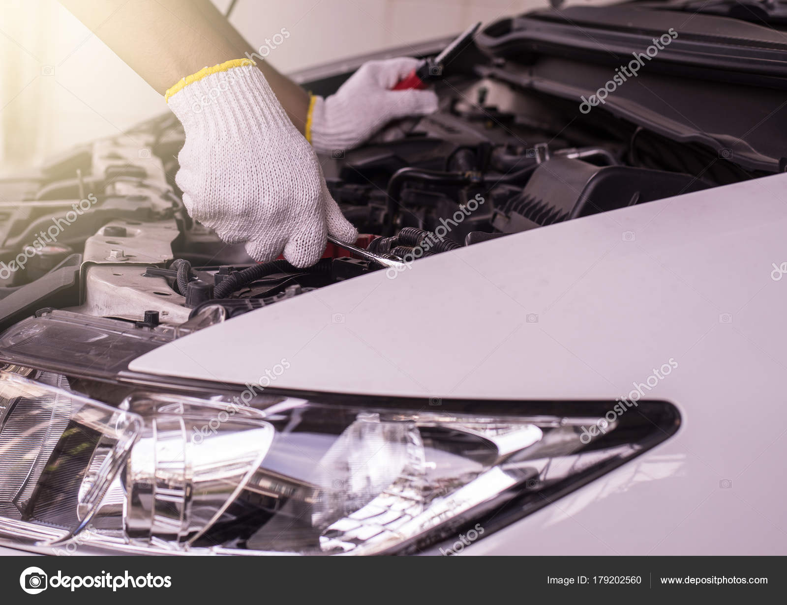 Closeup Hand Mechanic Engineer Fixing Car Battery Garage Concept