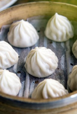 Xiaolongbao, Çince topuz tabağında, Dimsum buğulama