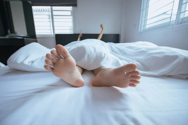 Close Barefoot Feet Stretch Oneself Bed Wake — стоковое фото