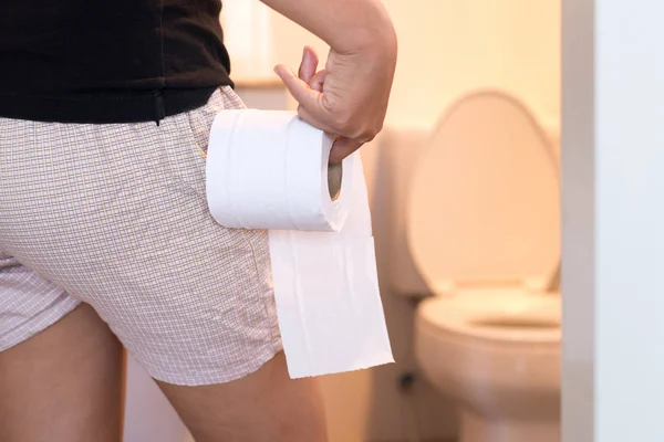 Woman Holding Toilet Paper Using Toilet Morning Pants Hanging Her — Stock Photo, Image