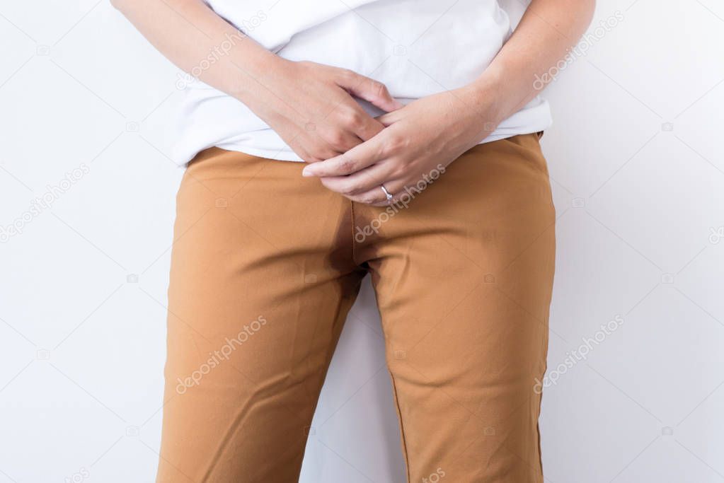 Hands woman holding her crotch,Female need to pee,Urinary stain incontinence,Copy space for text on white background