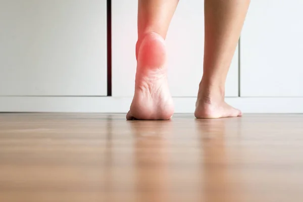 Female stretching and tiptoe foot in bedroom,Feet soles massage for plantar fasciitis,Close up