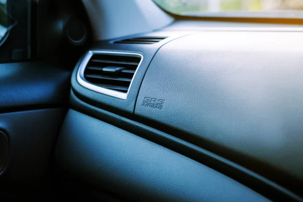 Air bag logo on dashboard in new modern car,Close up,SRS