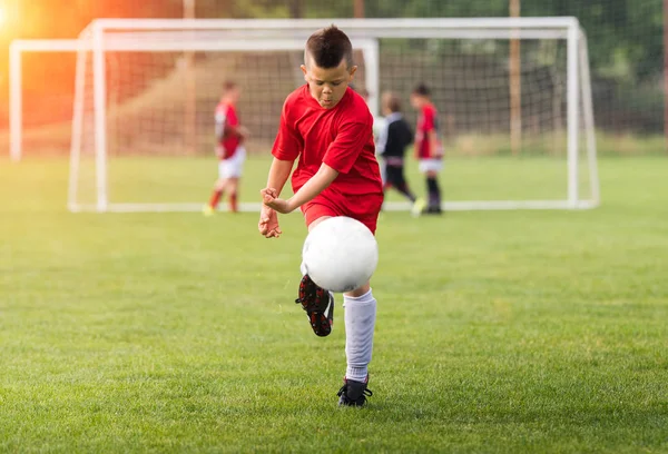 Kids soccer football - children players match on soccer field — Stock Photo, Image