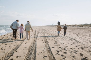 multigenerational family walking together clipart