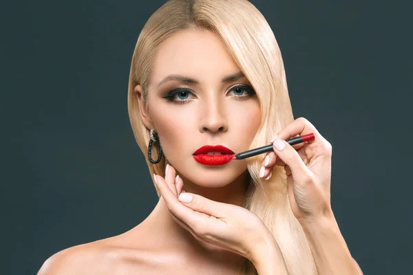 Beautiful Blonde Woman Making Red Lips Cosmetic Pencil Isolated Grey — Stock Photo, Image