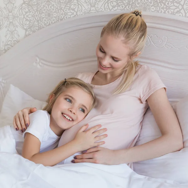 Happy Daughter Listening Pregnant Mother Belly — Stock Photo, Image