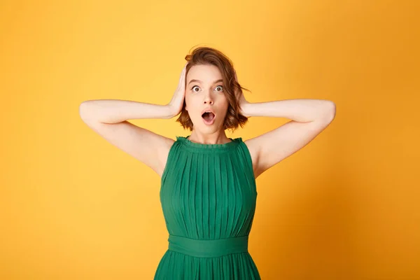 Portrait Young Shocked Woman Covering Ears Hands Isolated Orange — Stock Photo, Image