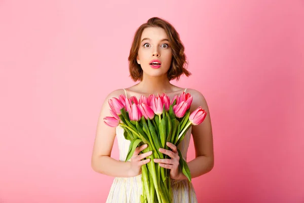 Shocked Young Woman Bouquet Pink Tulips Looking Camera Isolated Pink — Stock Photo, Image