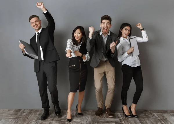 Happy Multicultural Business People Folders Notebooks Standing Grey Wall — Stock Photo, Image