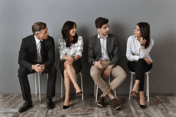 Interracial Business People Formal Wear Having Conversation Together While Waiting — Stock Photo, Image