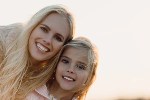 Blonde mom and daughter — Stock Photo