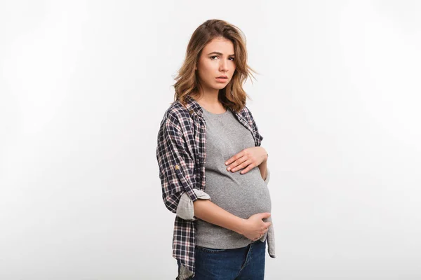 Triste mujer embarazada - foto de stock