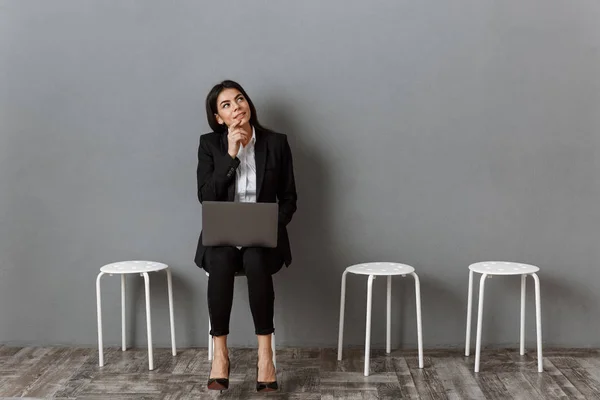 Pensive businesswoman — Stock Photo