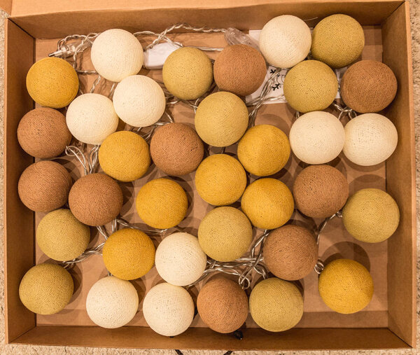 homemade light bulbs of yellow and brown color