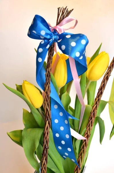 Spring Composition Two Easter Whips Bunch Yellow Tulips Empty Background Stock Photo