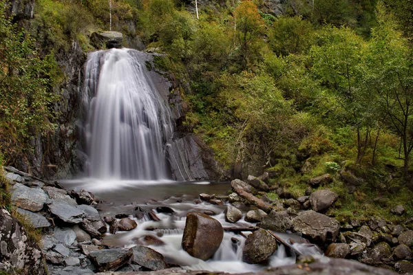 Russia. mountain Altai. Korbu waterfall is the most visited place of tourists all over the world on lake Teletskoye. It is at this waterfall the deepest place of the lake (325m).