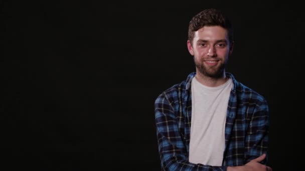 A Young Man Mimicing Against a Black Background — Stock Video