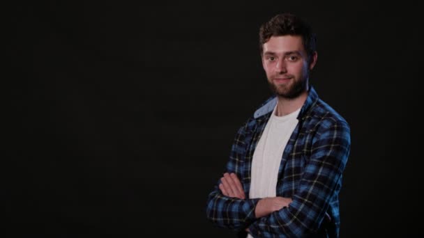 A Young Man Mimicing Against a Black Background — Stock Video