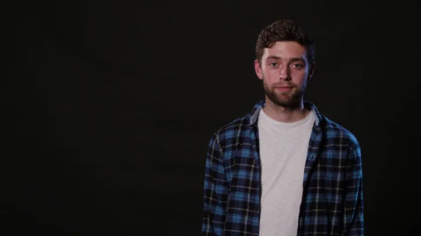 A Young Man Mimicing Against a Black Background — Stock Photo, Image