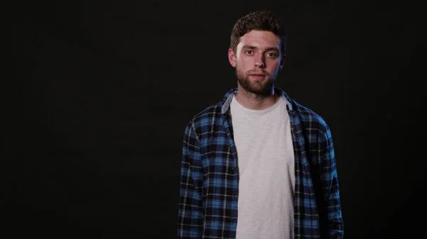 A Young Man Mimicing Against a Black Background — Stock Photo, Image