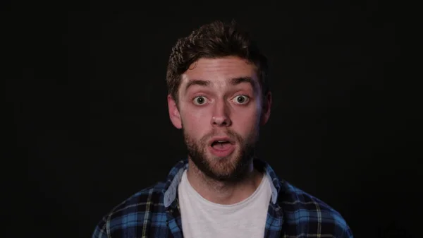 A Young Man Mimicing Against a Black Background — Stock Photo, Image