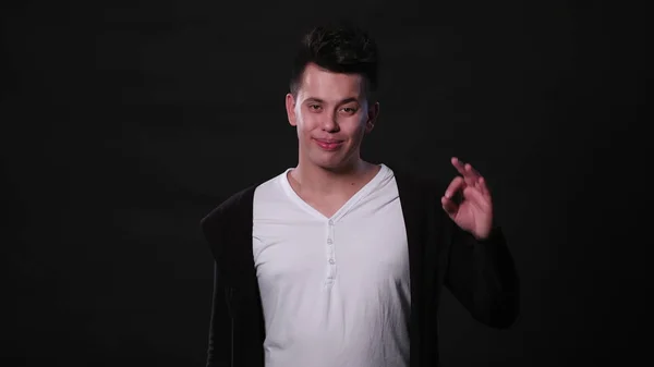 A Young Man Mimicing Against a Black Background — Stock Photo, Image