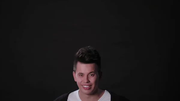 A Man Mimicing Against a Black Background — Stock Photo, Image