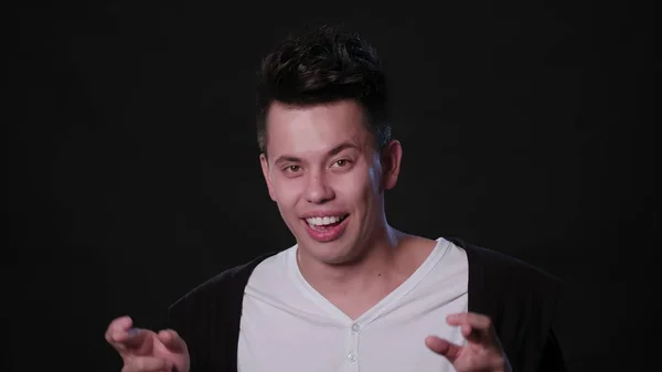 A Man Mimicing Against a Black Background — Stock Photo, Image