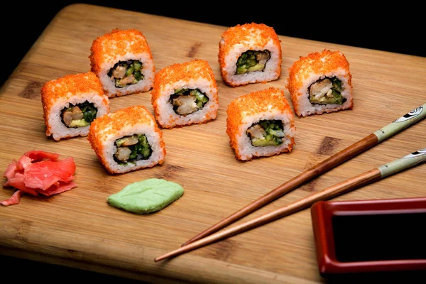 California roll sushi with shrimp, cucumber and avocado.